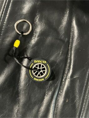 Invicta Black tire Keychain with Yellow Accent